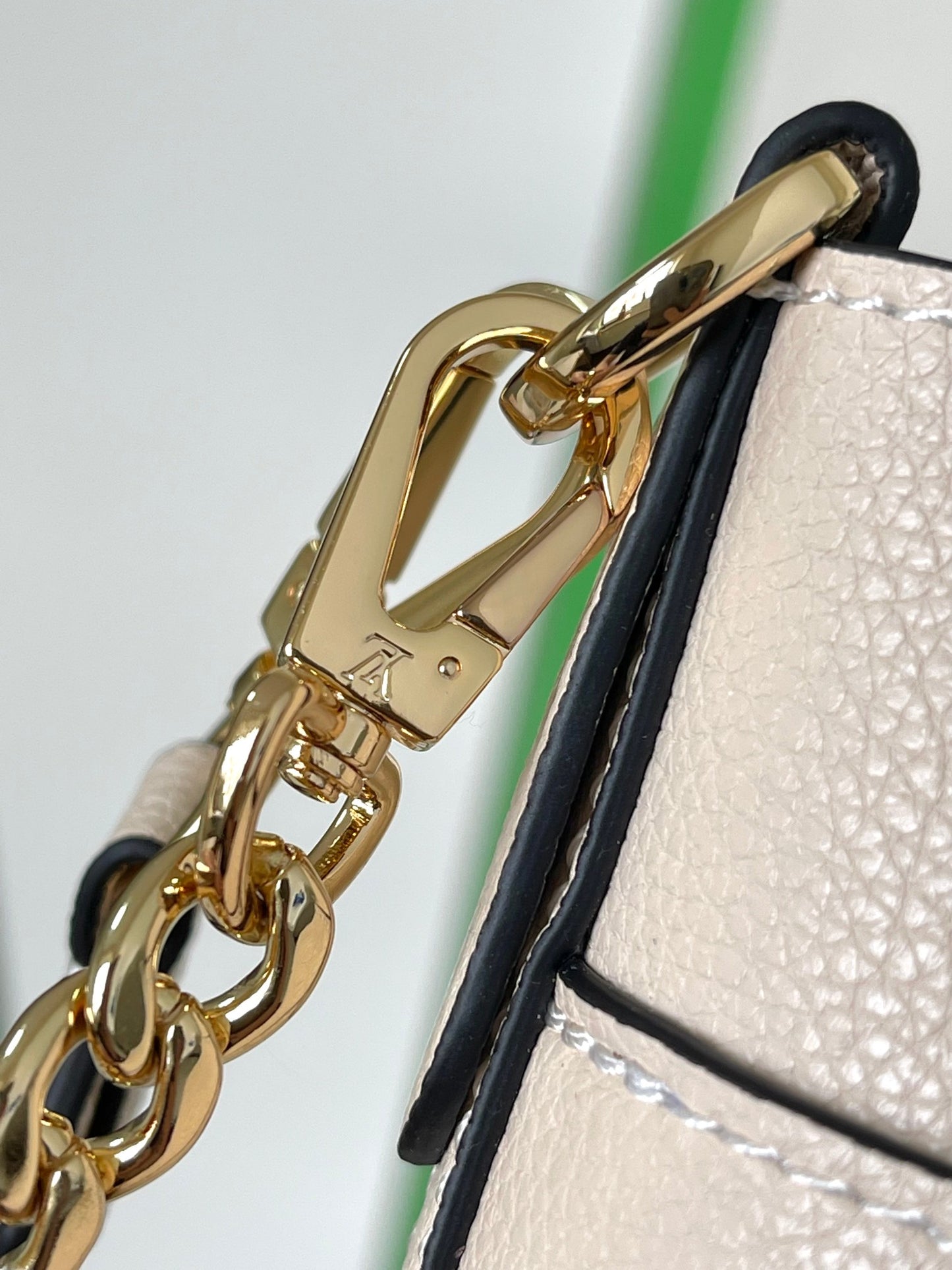Louis Vuitton Lockme Bucket Bag in Cream Grained Leather with Gold-Tone Hardware