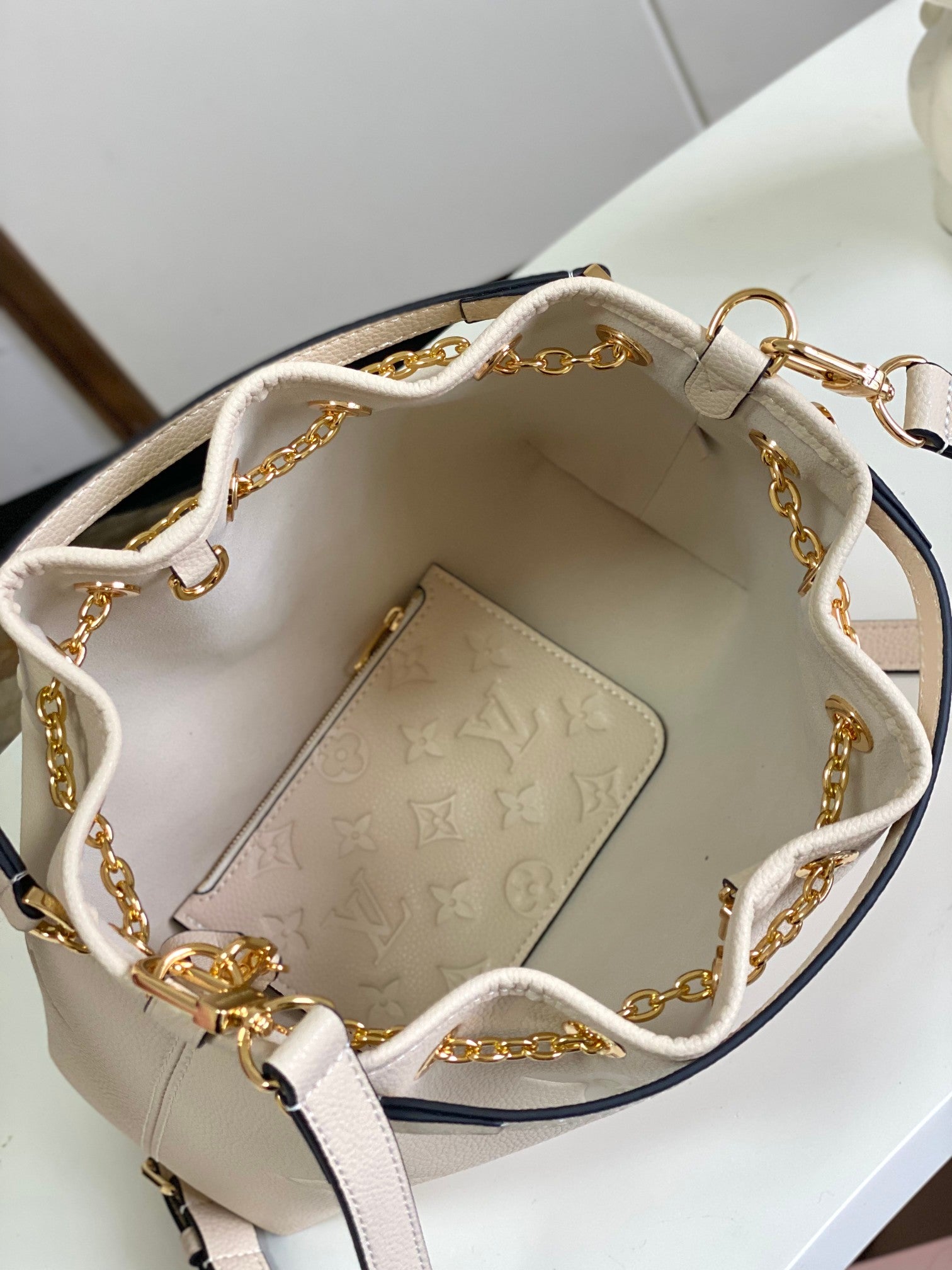 Louis Vuitton Muria Bucket Bag Monogram Mahina Perforated Leather Cream