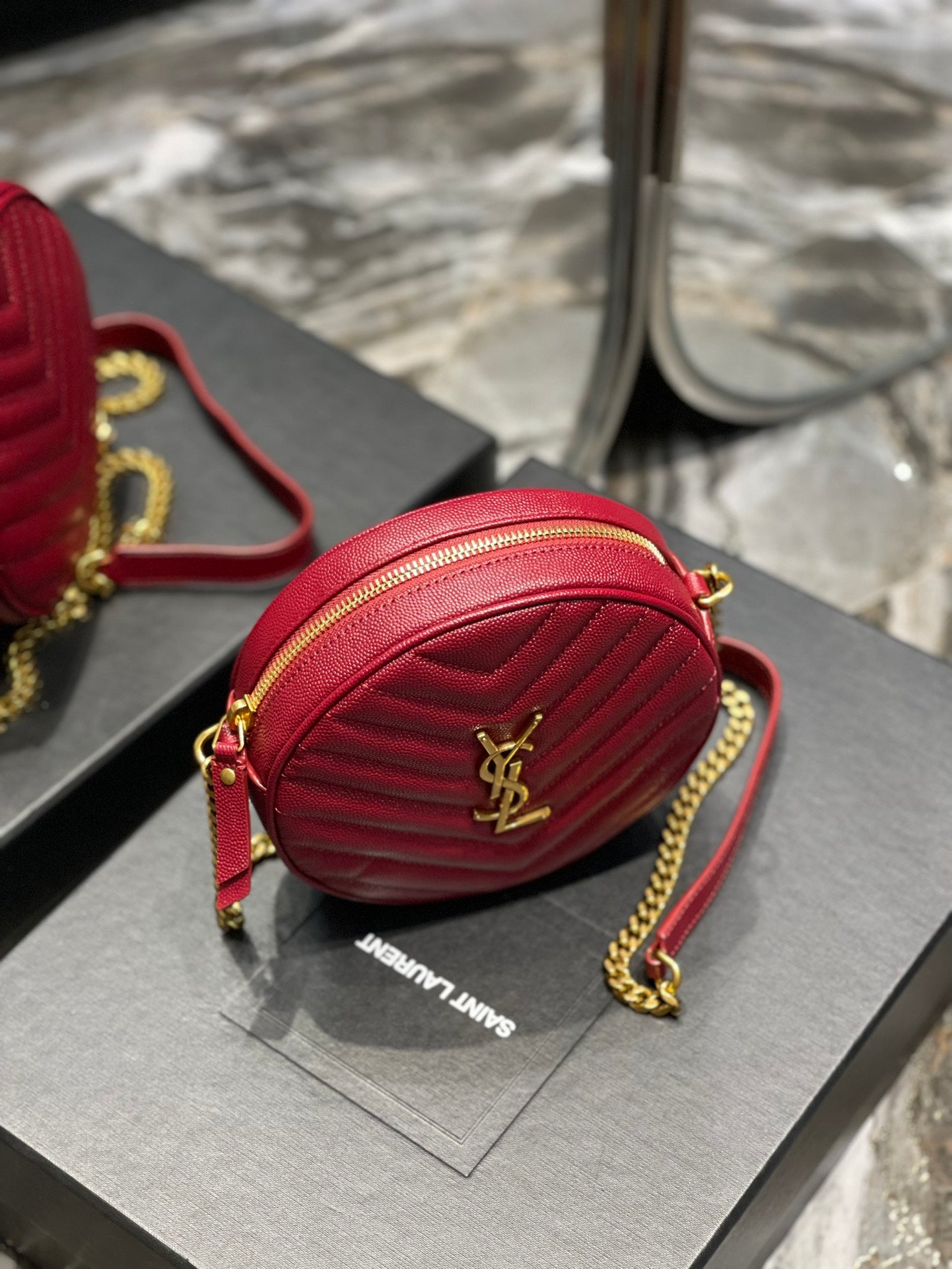 Saint Laurent Vinyle Round Camera Bag in Chevron-Quilted Leather - Red