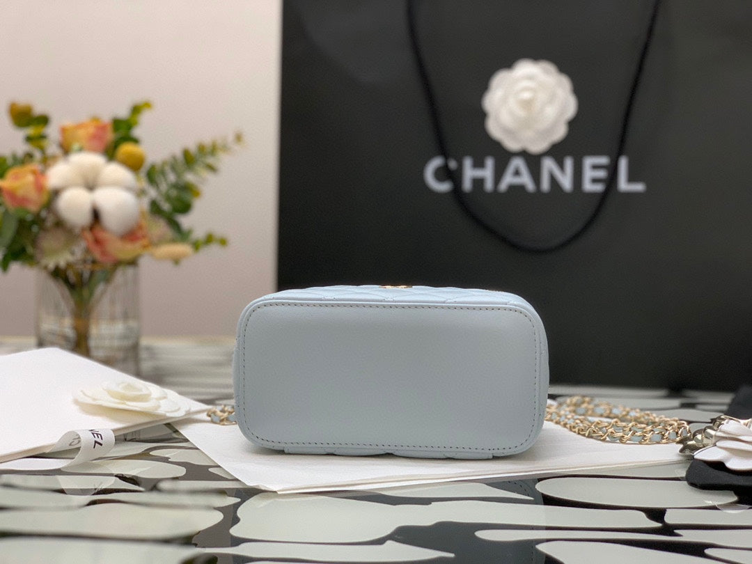 Chanel Quilted Light Blue Vanity Bag with Top Handle and Gold-Tone Hardware