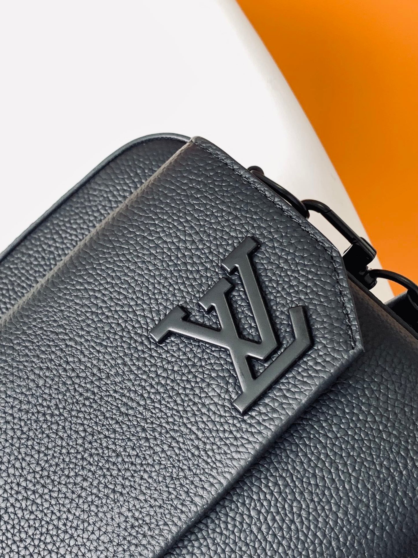 Louis Vuitton Minimalist Black Leather Crossbody Bag with Wide Adjustable Strap