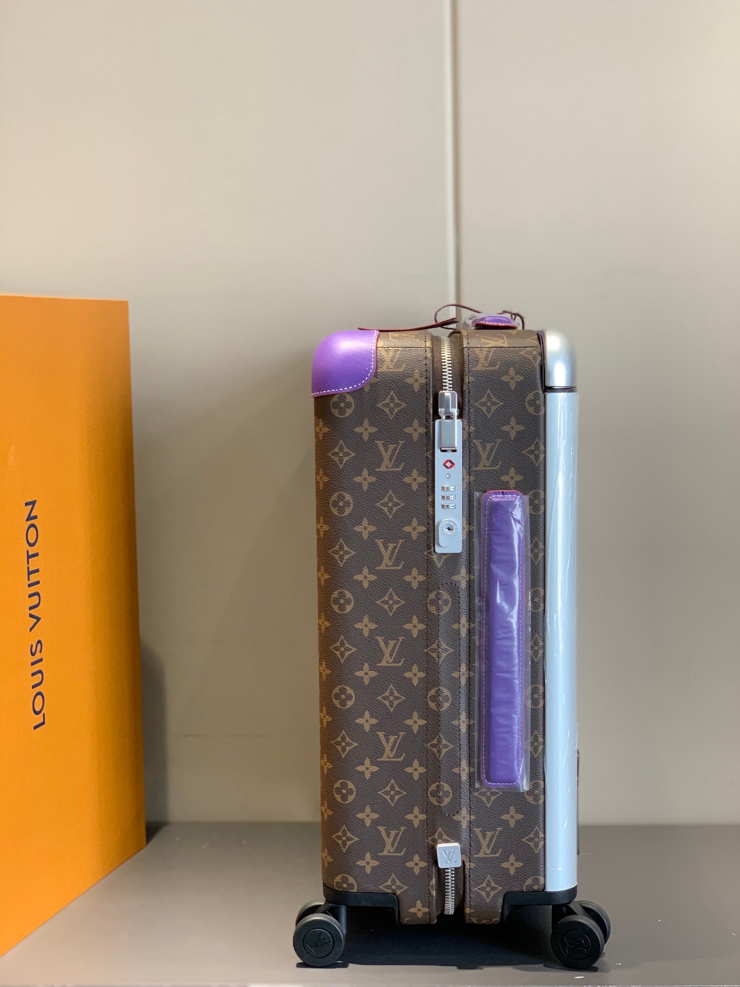 Luxury Brown Monogram Rolling Suitcase with Purple Accents