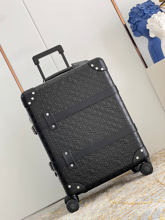 Vintage Black Embossed Leather Spinner Suitcase with Studded Corners