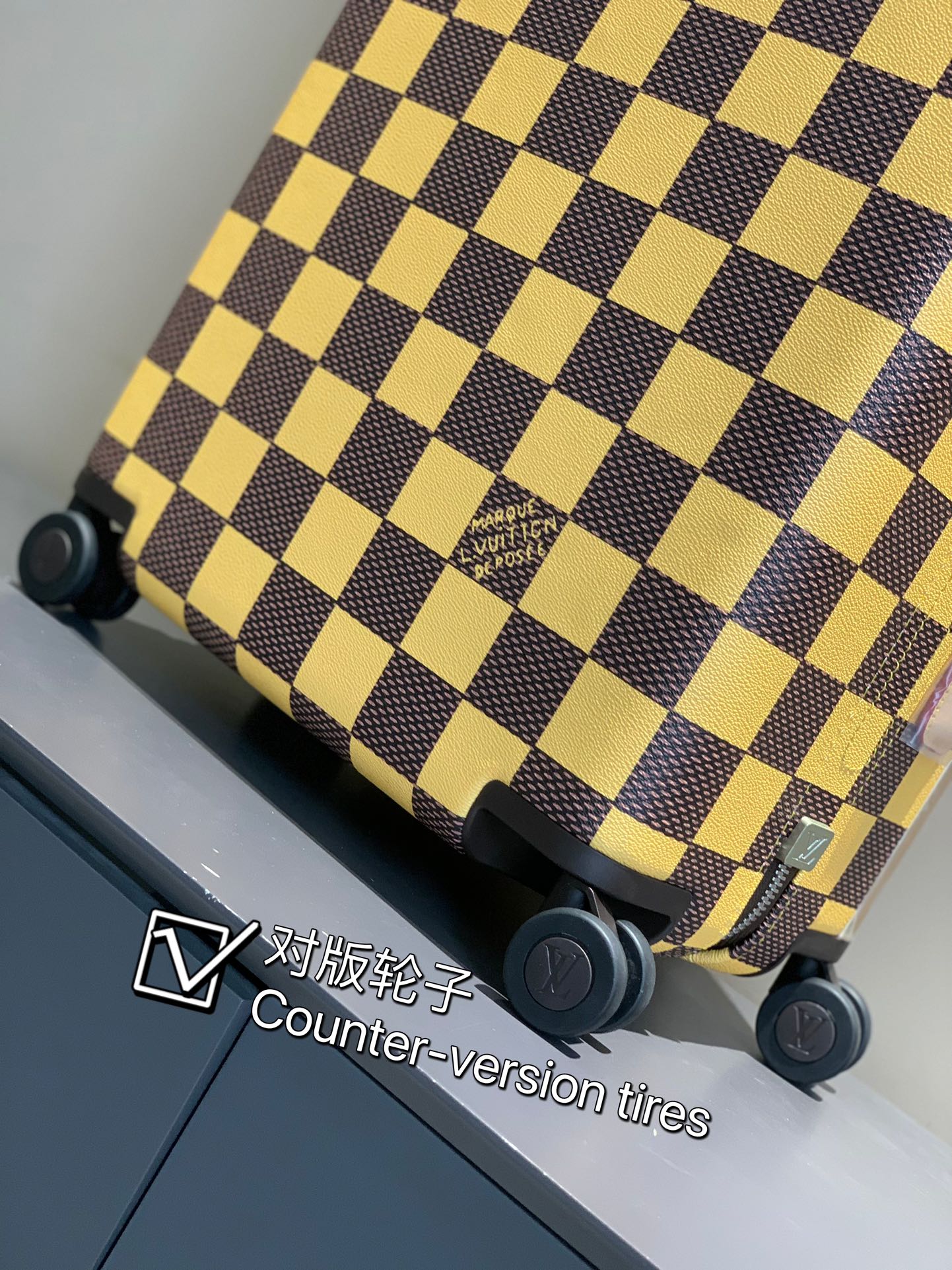 Checkerboard Pattern Rolling Suitcase with Leather Wrapped Handle