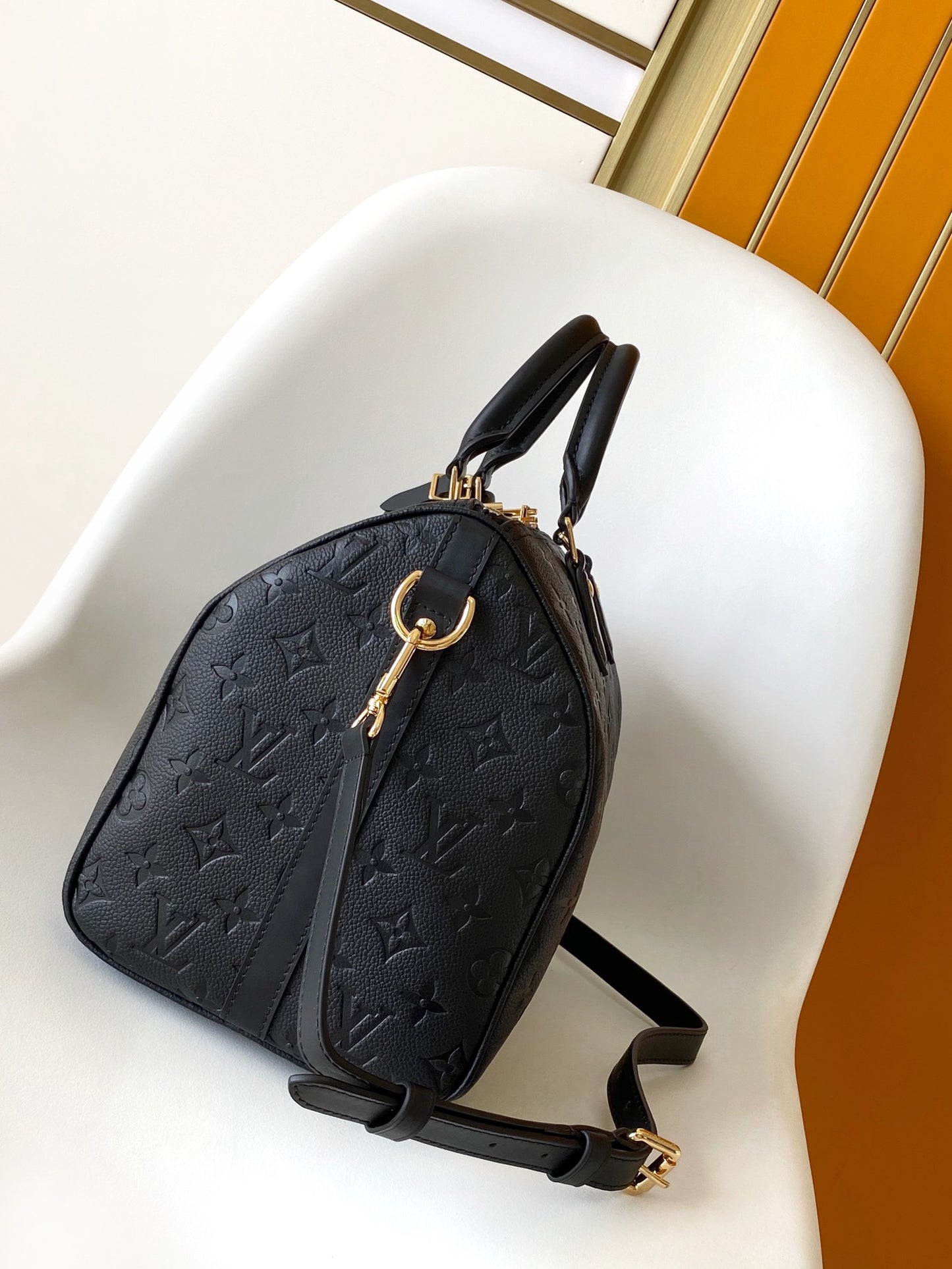 Louis Vuitton Black Embossed Leather Duffle Bag with Top Handles and Strap