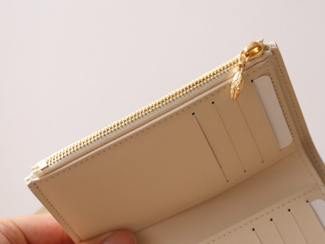 Louis Vuitton Luxury Cream Textured Leather Compact Wallet with Gold Clasp