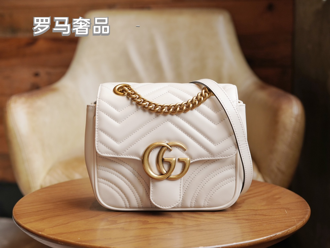 Gucci Elegant Quilted White Leather Shoulder Bag with Gold Chain Strap