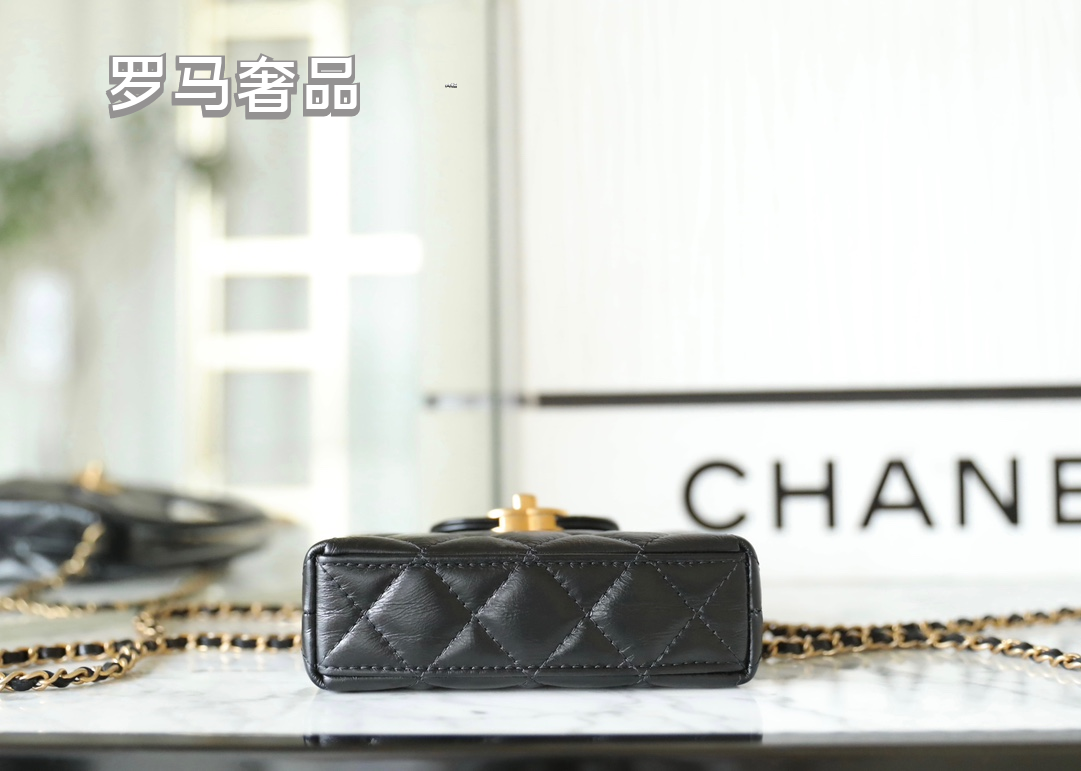 Chanel Black Quilted Lambskin Mini Top Handle Bag Gold-Tone Hardware